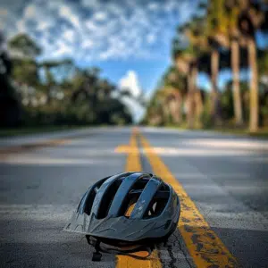 Bike helmet on road because of a Bicycle accident